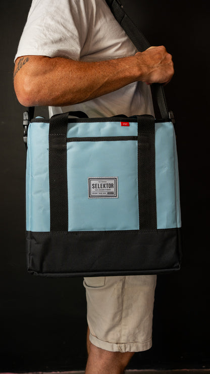 Selektor Messenger Bag, Light Blue and Black, Side View, Held