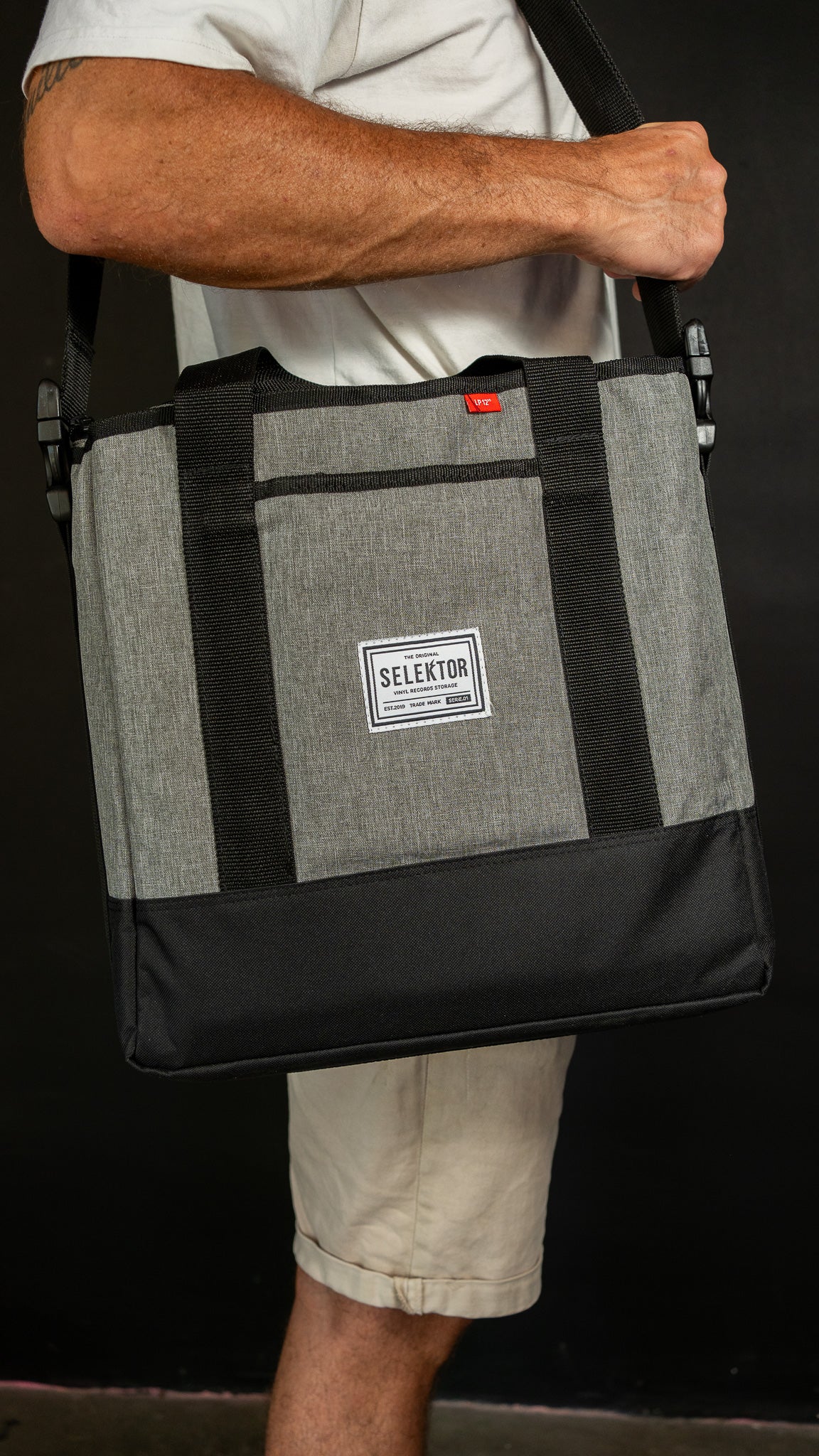 Selektor Messenger Bag, Melee Grey and Black, Side View, Held